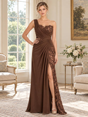 Front view of an elegant chiffon and floral lace mother of the bride dress featuring an asymmetrical one-shoulder neckline, pleated draped bodice, floral lace paneling, defined draped waist, high front slit with lace inset and floor-length A-line skirt.