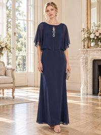 Front view of a navy chiffon mother of the bride dress featuring a jewel neckline, flowing cape overlay, front keyhole with silver rhinestone embellishment and an elegant floor-length A-line skirt.