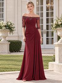 Front view of a burgundy chiffon and floral lace mother of the bride dress featuring an off-the-shoulder neckline, beaded floral lace trim, sheer elbow-length lace sleeves, asymmetric ruched bodice, draped waist and flowing floor-length A-line skirt.