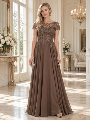 Front view of a floor-length mother of the bride dress featuring an embellished floral lace bodice, sheer illusion neckline, delicate cap sleeves, bead and embroidery detailing, defined natural waist and flowing chiffon A-line skirt.