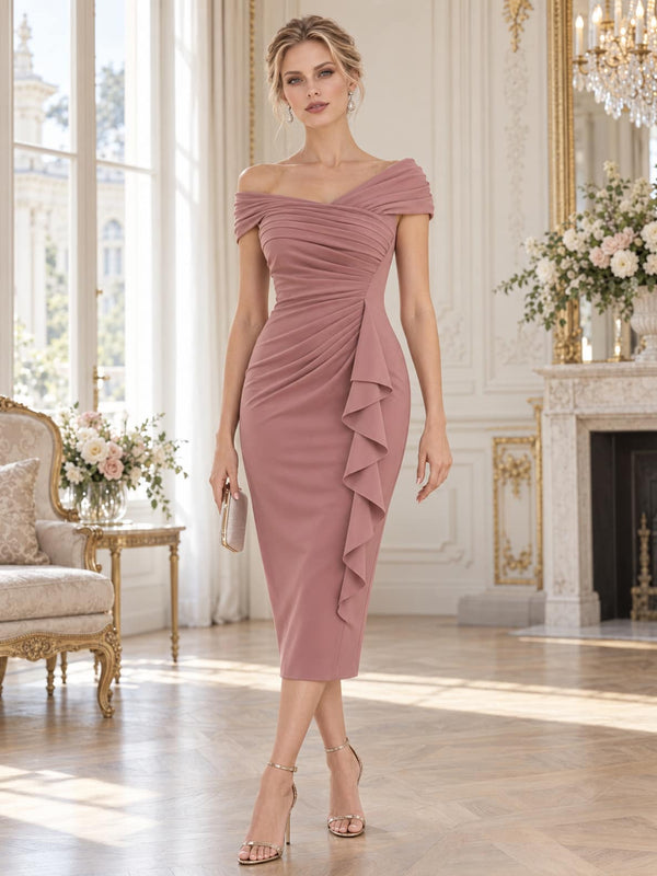 Front view of a dusty rose chiffon mother of the bride dress featuring an off-the-shoulder crossover neckline, diagonal ruched bodice, fitted sheath silhouette, cascading side ruffle and elegant tea-length hem.