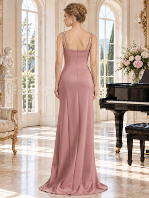 Back view of a dusty rose satin mother of the bride dress featuring delicate beaded double straps, a straight-back bodice, fitted sheath silhouette and center-back invisible zipper.