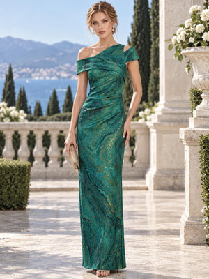 Front view of an emerald green and gold jacquard satin mother of the bride dress featuring an asymmetric off-the-shoulder neckline, diagonal shoulder detail, sculpted draped bodice, ruched waist and floor-length sheath silhouette.