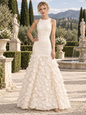 Front view of an ivory mother of the bride dress featuring a clean sleeveless round-neck fitted bodice and a dramatic floor-length mermaid skirt covered with dimensional 3D floral petal appliqués.