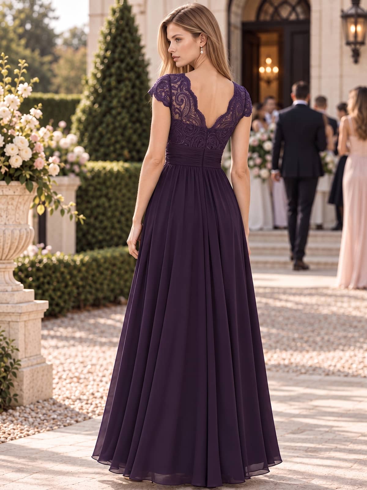 Lace chiffon A-line mother of the bride dress with deep V-back, floral lace bodice and floor-length skirt, back view.
