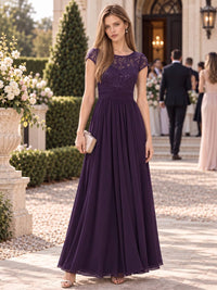 Lace chiffon A-line mother of the bride floor-length evening dress with illusion neckline and ruched waist, front view.