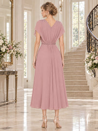 Chiffon A-line mother of the bride midi dress with cape sleeves, beaded shoulders and deep V-back, back view.