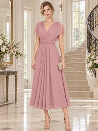 Chiffon A-line mother of the bride midi evening dress with V-neckline, cape sleeves and beaded waist detail, front view.