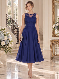 Floral lace chiffon A-line midi mother of the bride dress with illusion neckline and defined waist, front view.