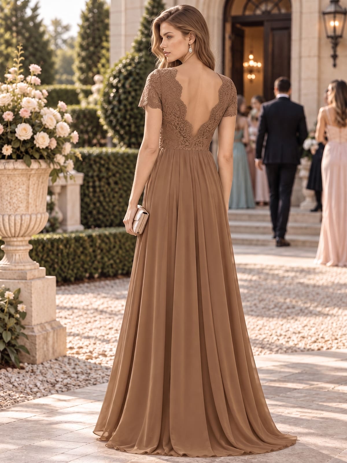 Floral lace chiffon mother of the bride dress with deep V-back and flowing floor-length A-line skirt, back view.