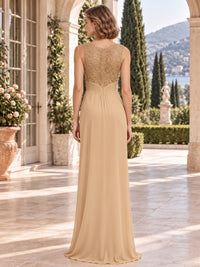 Beaded floral lace chiffon mother of the bride dress with lace back bodice, center-back closure and flowing floor-length A-line skirt, back view.