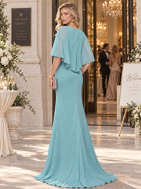 Chiffon sheath mother of the bride evening dress with flowing cape overlay and clean back design, back view.