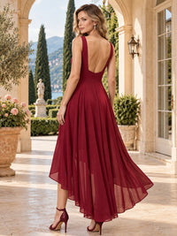 Chiffon A-line mother of the bride evening dress with deep scoop back, flowing high-low skirt and center-back zipper, back view.