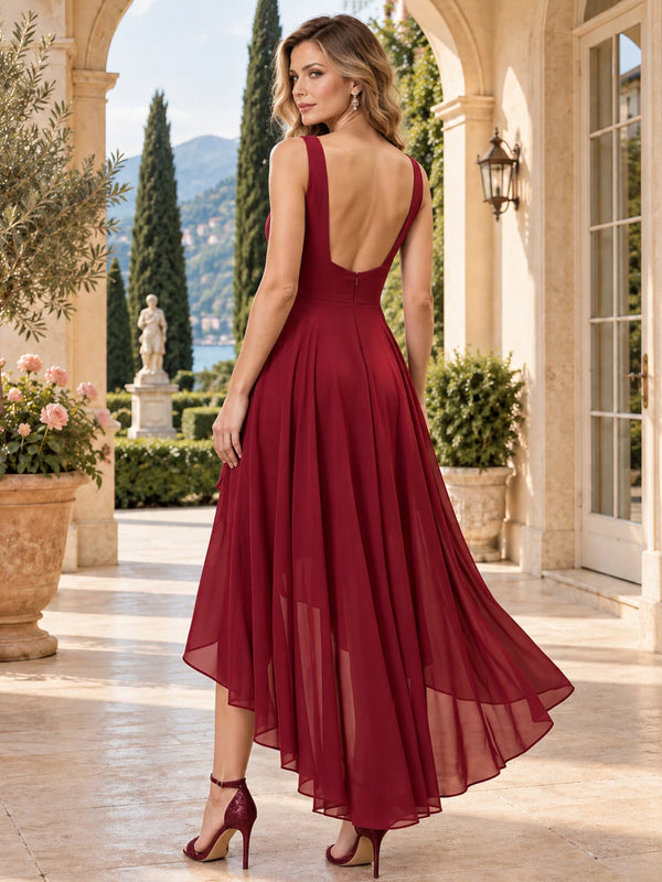 Chiffon A-line mother of the bride evening dress with deep scoop back, flowing high-low skirt and center-back zipper, back view.