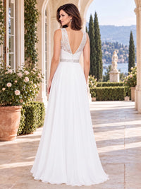 Back view of a lace chiffon A-line mother of the bride dress with deep V lace back, embellished waist and floor-length chiffon skirt.