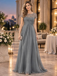 Front view of an As Pic Color beaded lace chiffon A-line mother of the bride dress with bateau neckline, short sleeves and ruched bodice.