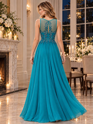 Back view of an embroidered floral chiffon A-line mother of the bride dress with illusion floral panel, keyhole back and flowing floor-length skirt.