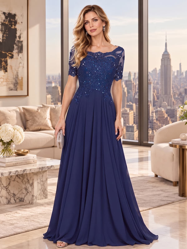 Front view of a beaded lace chiffon A-line mother of the bride dress with illusion neckline, short sleeves and floor-length skirt.
