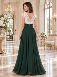 Back view of a floral lace chiffon A-line mother of the bride dress with deep V-back, ruched waist and center-back zipper.