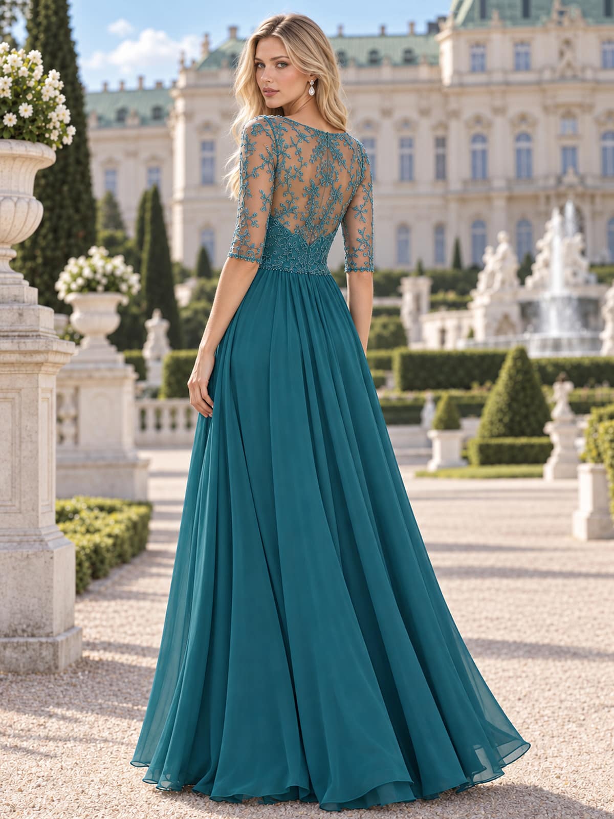 Back view of a floral lace chiffon A-line mother of the bride dress with sheer lace back, elbow sleeves and center-back zipper.