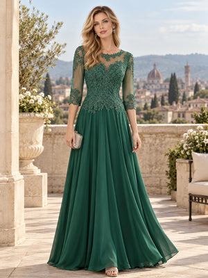 Front view of a floral lace chiffon A-line mother of the bride dress with illusion neckline, three-quarter sleeves and floor-length skirt.
