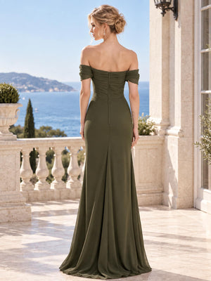 Back view of an off-shoulder chiffon mother of the bride dress with fitted bodice, floor-length sheath silhouette and center-back zipper.