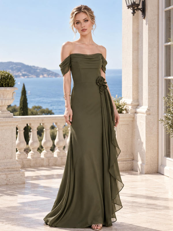 Front view of an off-shoulder chiffon mother of the bride dress with ruched bodice, 3D floral detail, cascading side ruffle and floor-length skirt.