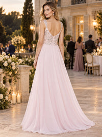 Back view of a beaded floral chiffon A-line mother of the bride dress with deep V-back, embellished bodice and center-back zipper.