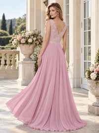 Back view of a floral lace chiffon A-line mother of the bride dress with deep V-back, lace bodice and center-back zipper.