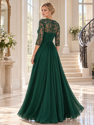 Back view of a floral lace chiffon A-line mother of the bride dress with sheer lace upper bodice, ruched waist and center-back zipper.