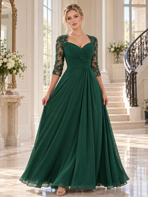Front view of a floral lace chiffon A-line mother of the bride dress with sweetheart neckline, three-quarter lace sleeves and floor-length skirt.